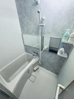 a bathroom with a sink and a mirror at Higashiasakusa house 1F-TT0365 in Tokyo