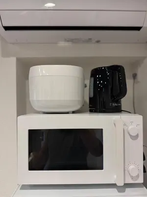 a white microwave oven with a toaster on top of it at Higashiasakusa House 2-3F-TT0366 in Tokyo