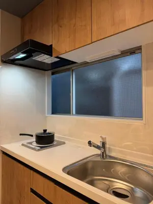 a kitchen counter with a sink and a window at Higashiasakusa House 2-3F-TT0366 in Tokyo
