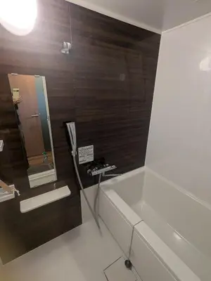 a bathroom with a bath tub and a sink at Quiet residential room 408 walking distance of Shinjuku in Tokyo