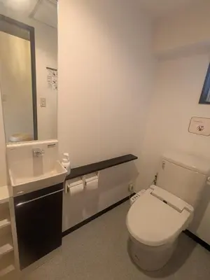 a bathroom with a white toilet and a sink at Quiet residential room 408 walking distance of Shinjuku in Tokyo