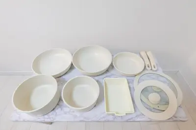 a group of white cups and plates on a table at LIVCITY Kinshicho 1102 Skytree view in Tokyo