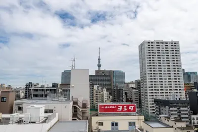 a view of a city skyline with buildings at LIVCITY Kinshicho 1102 Skytree view in Tokyo