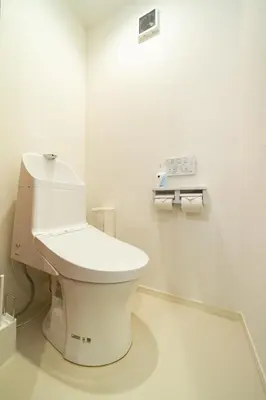 a bathroom with a toilet in a white room at 107, Takasago A,,Entire house for rent \u9ad8\u7802A in Tokyo