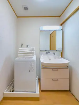 a bathroom with a sink and a mirror at \u62bc\u4e0ahotel max4 people -SM0385 in Tokyo