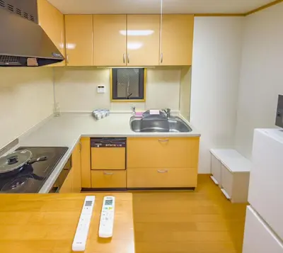 a small kitchen with a sink and a counter at \u62bc\u4e0ahotel max4 people -SM0385 in Tokyo
