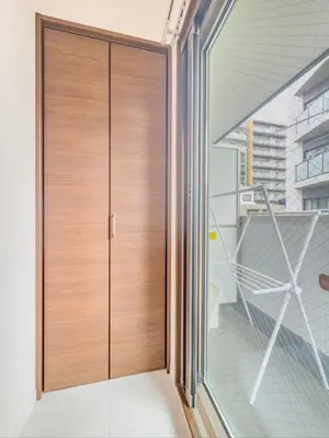 a wooden door in a room with a window at \u79cb\u53f6\u539f hotel -TT0379 in Tokyo