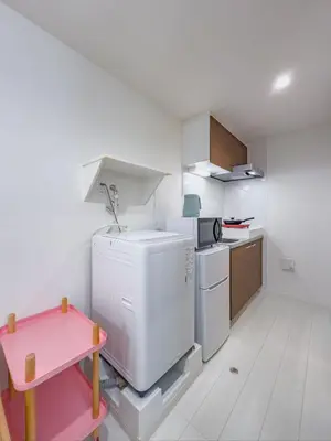 a white kitchen with a sink and a dishwasher at \u79cb\u53f6\u539f hotel -TT0379 in Tokyo