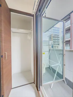 a glass door in a room with a balcony at \u79cb\u53f6\u539f hotel -TT0379 in Tokyo