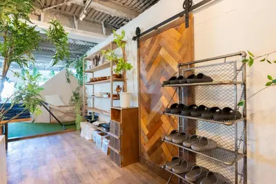 a room with plants on the wall at CREA BASE -Indoor Glamping Retreat- in Tokyo