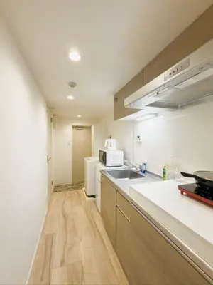 a kitchen with a sink and a counter top at \u9526\u7cfb\u753a hotel -SM0380 in Tokyo
