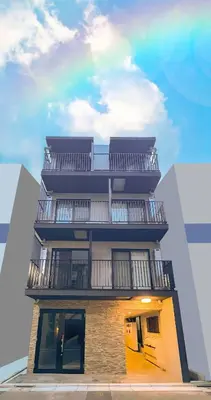 a tall building with balconies on top of it at \u6d45\u8349 ideas hotel \u5927\u5e8a\u623f-TT0390 in Tokyo