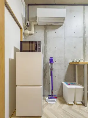 a white refrigerator in a room with a air compressor at \u6d45\u8349 ideas hotel max 6 people -TT0392 in Tokyo