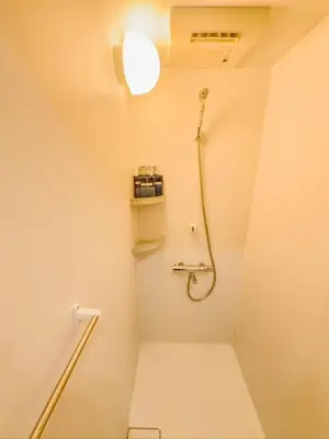a bathroom with a shower and a toilet at \u6d45\u8349 ideas hotel max 6 people -TT0392 in Tokyo