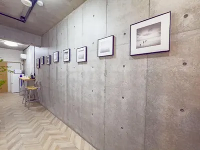 a wall with a bunch of pictures on it at \u6d45\u8349 ideas hotel max 6 people -TT0392 in Tokyo