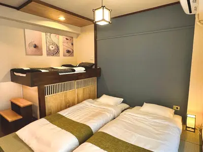 two beds in a room with two at #202 Tokyo Ryogoku Hokusai Katsushika in Tokyo