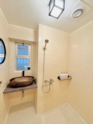 a bathroom with a wooden toilet in a shower at #202 Tokyo Ryogoku Hokusai Katsushika in Tokyo