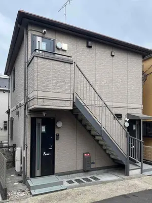 a building with a staircase on the side of it at \u30e1\u30be\u30f3\u67cf\u6728 in Tokyo