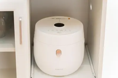 a white toaster sitting in a white refrigerator at GLOU Shibuya House - A Private House in Tokyo Shinjuku & Shibuya Area in Tokyo