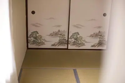 a room with three paintings on the wall at Historic House in Sangenjaya - Central Tokyo Stay in Tokyo