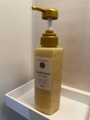 a bottle of cannulation soap sitting on a shelf at \u65b0\u7bc9OPEN GREW OJI residence102 in Tokyo