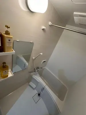 a bathroom with a sink and a mirror at \u65b0\u7bc9OPEN GREW OJI residence102 in Tokyo