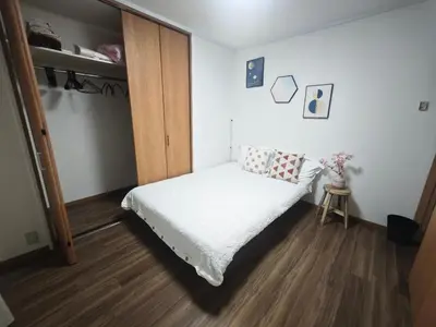 a bedroom with a bed and a bunk bed at ZYZ Negishi\u9daf\u8c37\u99c5 TT0257 in Tokyo