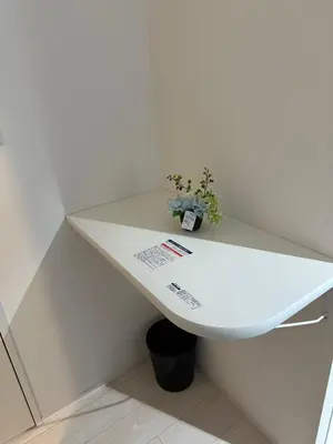 a white desk with a potted plant on top of it at \u65b0\u7bc9OPEN GREW OJI residence201 in Tokyo