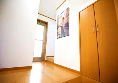 an empty room with a door and a window at \u6771\u4eac\u90fd\u845b\u98fe\u533a\u306e\u8cb8\u5207\u4e00\u8ed2\u5bb6 in Tokyo