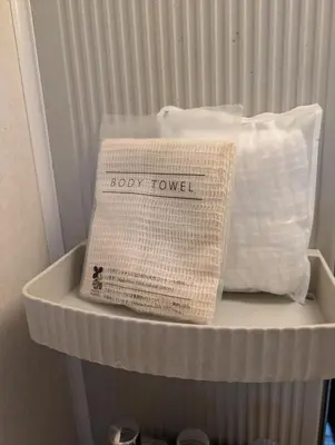 a white crib with a pillow on top of it at MerisuKabukicho,Tokyo in Tokyo