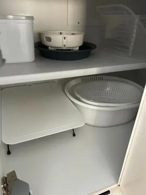 a white kitchen shelf with a bowl and a appliance at Near JR Kameari Tokyo - Shades of Green - Japanese House for up to 6 Guests in Tokyo