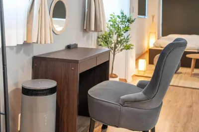 a room with a desk and a chair and a bedroom at Nestry Asakusa 502\u53f7\u5ba4 in Tokyo