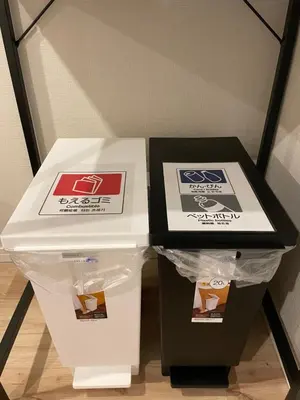 two boxes of food sitting on top of a table at T-Hotel\u5165\u8c37 in Tokyo