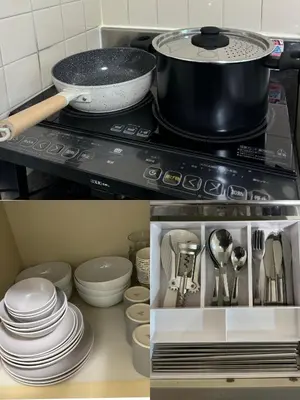 a kitchen with a pot on a stove with plates and utensils at LoveAsakusa Stay 6 Iriya Station Ueno Station 2\u30fc6\u4eba \u30a8\u30ec\u30d9\u30fc\u30bf\u30fc WIFI \u6d45\u8349 \u65b0\u5bbf \u6e0b\u8c37 \u9280\u5ea7 \u7bc9\u5730 \u6d45\u8349 \u539f\u5bbf\u8fd1\u3044 in Tokyo