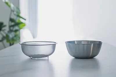 two metal bowls sitting on a table at SLL Urban Suites Ebisu in Tokyo
