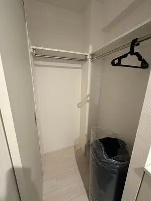 a bathroom with a closet with a trash can at \u65b0\u7bc9OPEN GREW OJI residence301 in Tokyo