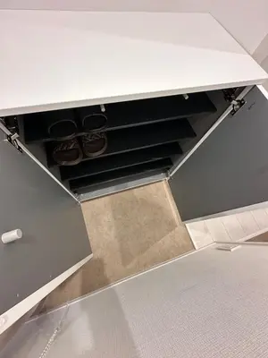a drawer in a kitchen with some shoes in it at \u65b0\u7bc9OPEN GREW OJI residence302 in Tokyo