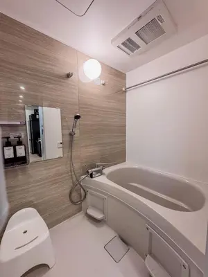 a bathroom with a bath tub and a toilet at Triphome Asakusa Alpha 3min to Sensoji Temple in Tokyo