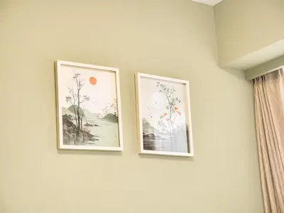 two framed pictures on a wall at Triphome Nakano Japanese Style in Tokyo