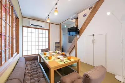 a living room with a couch and a table at Tokyo Akabane 2BR MAX5, Ikebukuro Shinjuku Ueno Ginza in Tokyo