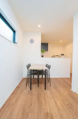 a dining room with a table and chairs at \u6c60\u888b\u6238\u5efa in Tokyo