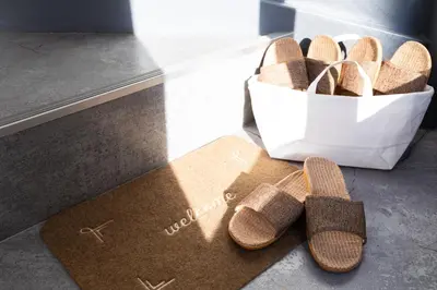 a pair of flip flops and a bag of sandals at Ueno-an 4,5F in Tokyo