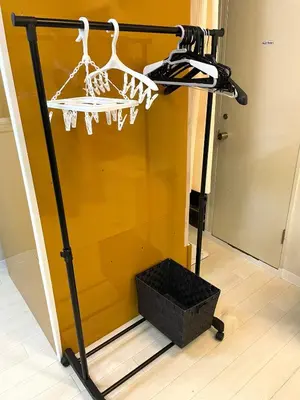a basketball rack with two hangers and a basket at Budget Private StayIkebukuro Anime Area Sleeps 7 in Tokyo