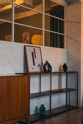 a shelf with a laptop on top of a wall at \u30a2\u30d0\u30f4\u6e0b\u8c37\u30d3\u30eb2\u968e in Tokyo
