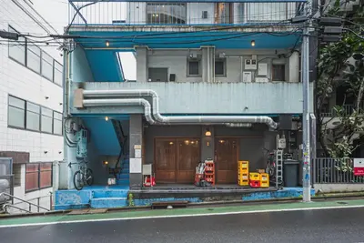 a building with pipes on the side of it at \u30a2\u30d0\u30f4\u6e0b\u8c37\u30d3\u30eb2\u968e in Tokyo