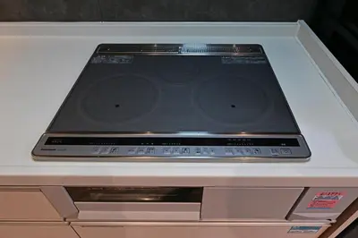 a dvd player sitting on top of a box at Rakuna Inn \u8679 Oshiage2 in Tokyo