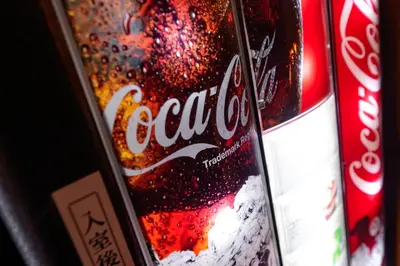 a can of cocacola soda sitting on top of a bottle at \u30db\u30c6\u30eb\u30a6\u30a4\u30eb\u30b7\u30c6\u30a3\u6d45\u8349\u672c\u9928 in Tokyo