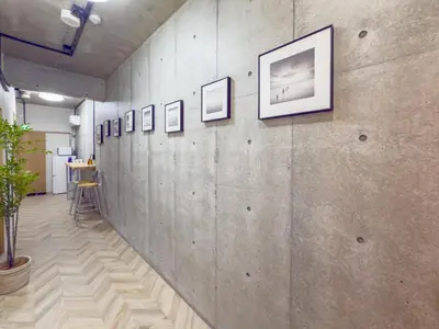 a wall with a bunch of pictures on it at ideas ASAKUSA Hotel in Tokyo