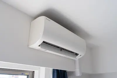 a white tv hanging from a ceiling at Artessimo \u62bc\u4e0a402 in Tokyo