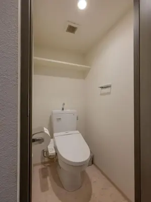 a bathroom with a white toilet in a room at Artessimo \u62bc\u4e0a402 in Tokyo